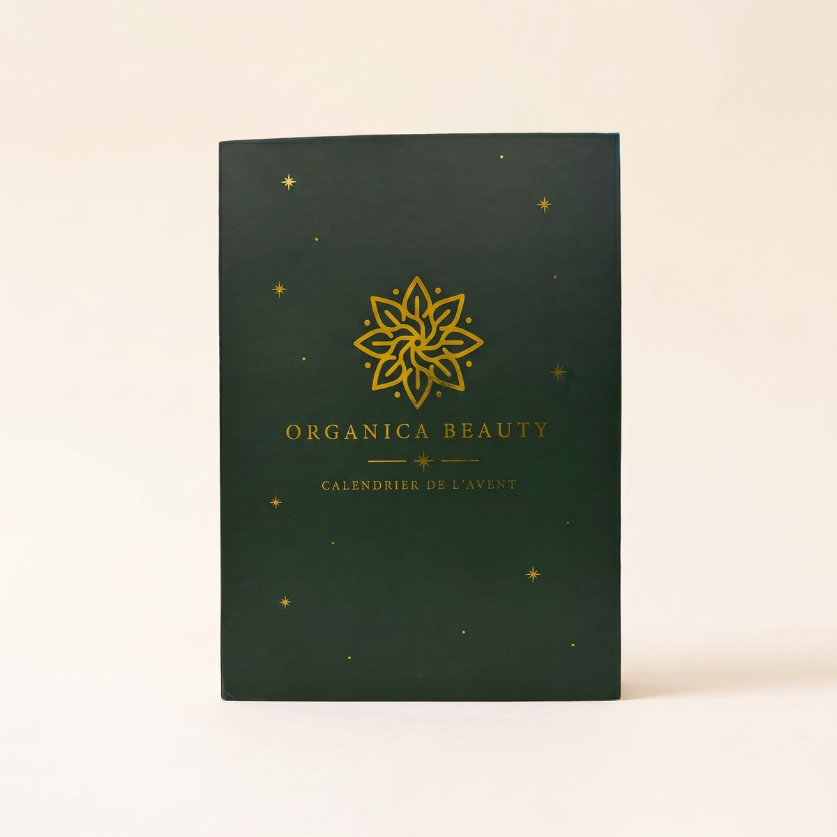 Calendrier de l'Avent Organica Beauty fermé, coffret vert et or